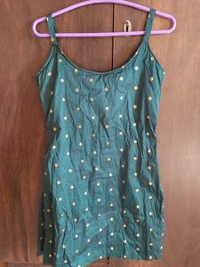 Bottle green brocade sleeveless kurti