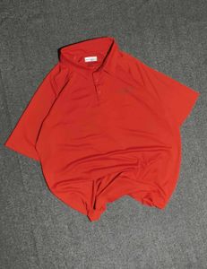 Columbia men's orange polo shirt