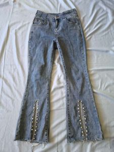 Flared Jeans with Studded Slits