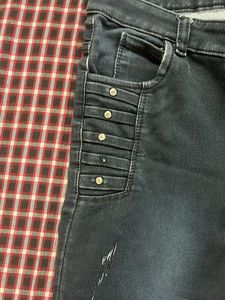 Dark Wash Ripped Jeans with Embellished Pockets