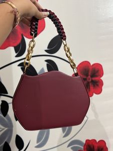 Chic Maroon Lip-Shaped Clutch Bag