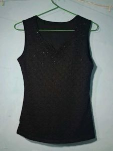 combo of Sleek Black Sleeveless Top and pink to