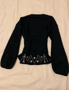 Space embroidered sweater