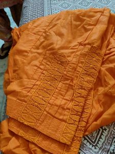 Elegant Orange  green salwars with Lace Detail