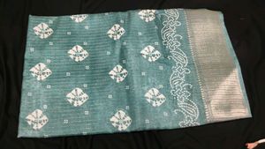 Beautiful Teal Saree with White Motifs