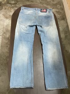 Light Wash Denim Jeans with Bear Patch