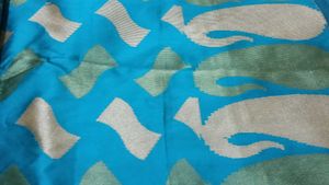 Beautiful Blue Saree with Intricate Patterns