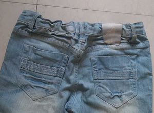 Distressed Jeans with Pearl &amp; Lace Detail