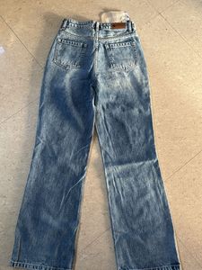 Distressed Blue Denim Jeans