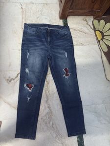 Distressed Denim Jeans with Plaid Detail