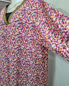 Chic Floral Print Top with Embellished Neckline