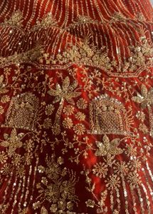 Stunning Orange Embellished Lehenga Choli