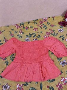 Coral Off-Shoulder Smocked Top