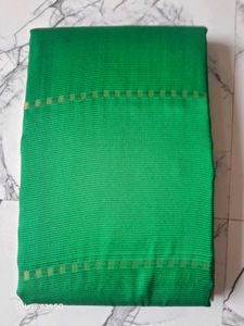 Elegant Green Saree with Gold Border