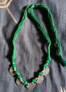 Green Beaded Necklace with Silver Charms