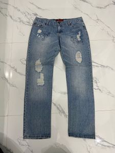 Light Wash Distressed Denim Jeans