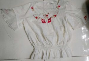Embroidered Peplum Top with Ruffle Sleeves