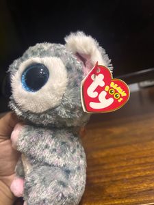 Ty kola plushie with sparkling eyes