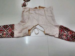 Elegant White Lehenga with Embellished Border