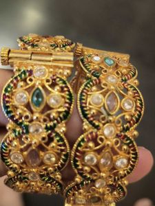 Elegant Gold Bangles with Multi-colored Stones