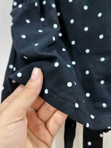 Black polka dot top with Bow Cut Out Detail
