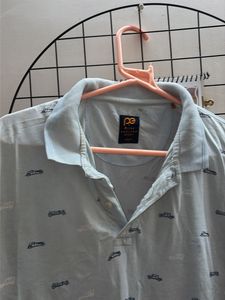 Light Blue Polo Shirt with Car Print
