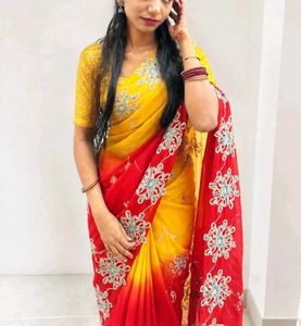 Vibrant Yellow & Red Embroidered Saree