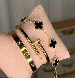 Gold Bangle, Clover Bracelet &amp; Nail Bangl
