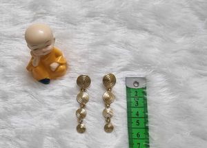 Gold spiral dangle earrings