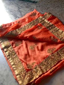 Elegant Orange Embroidered Saree