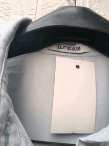 New with tag Light Blue Collared Button-Up Shirt