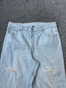 Wide Leg Distressed Jeans - Light Wash