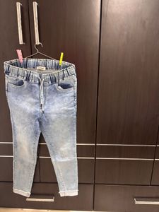 Light Wash Distressed Denim Jeans