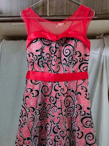 Glittery Red Gown With Black Detailing