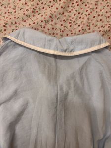 Blue top with White Trim