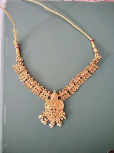 7.Exquisite Gold-Tone Necklace with Pendant