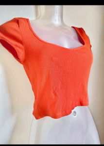 Orange Ribbed Cropped Top