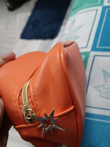 Vibrant Orange Faux Leather Pouch