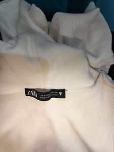 Sleeveless White Turtleneck Crop Top