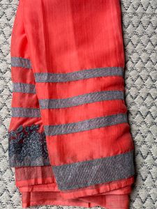 Vibrant Coral Saree with Embellished Border