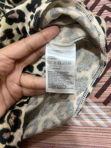 Leopard design top high neck