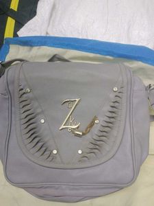 Stylish Grey Shoulder Bag with Embellishments