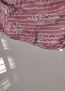 pink short kurtha with white print