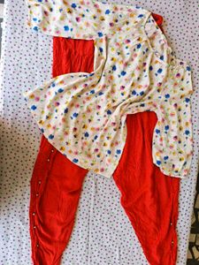 Floral top with Red Dhoti Pants