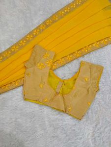Bright Yellow Saree With Embellished Blouse