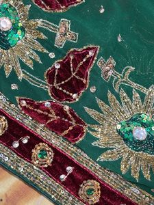 Elegant designer heavy work green  georgette saree