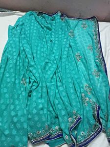 Stunning Teal Saree with Embellished Blouse