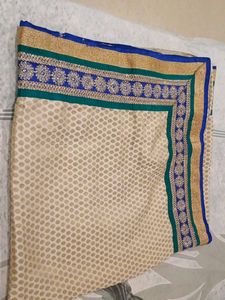 Embellished Beige Saree with Blue Border