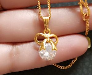 Gold Bow Pendant Necklace for daily use