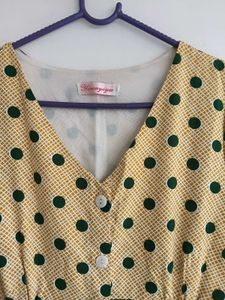 Green polka dot yellow dress